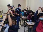 tim-polres-jakarta-pusat-menggerebek-tempat-pinjaman-online-di-kawasan-jakarta-barat.jpg