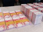uang-palsu-pecahan-seratus-ribu_20181019_095733.jpg