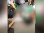 video-anggota-tni-dan-polisi-menjatuhkan-hingga-memiting-warga-di-depok-viral-di-media-sosial.jpg