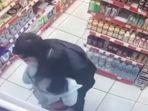 viral-rekaman-CCTV-sepasang-kekasih-berbuat-mesum-di-minimarket.jpg