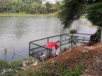 warga-memancing-ikan-di-situ-gintung.jpg