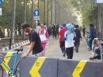 warga-yang-datang-berolahraga-di-jalan-inspeksi-kbt-duren-sawit.jpg