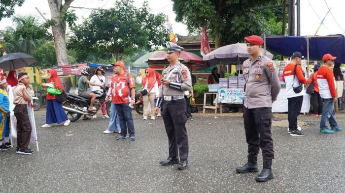 104 Polisi Amankan Pawai Pembangunan HUT RI Ke 80 Tahun di Merangin