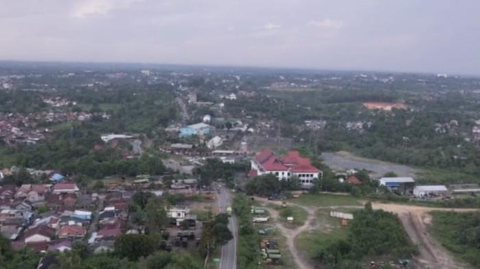 BERSEBERANGAN - Foto udara lokasi gerbang TUKS milik PT Sinar Anugerah Suskes