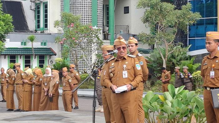 SANKSI ASN-Pemkot Jambi memberhentikan empat ASN dan memproses empat lainnya akibat pelanggaran disiplin dan pidana akibat judol dan pinjol.