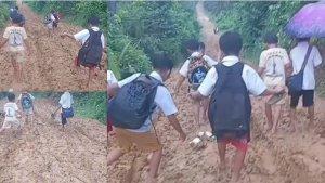 20250126-anak-anak-lewati-jalan-rusak-di-Bungo-Jambi.jpg