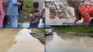 20251024-Siswa-SD-dan-guru-gotong-royong-di-Jalan-rusak-kerinci-Jambi.jpg