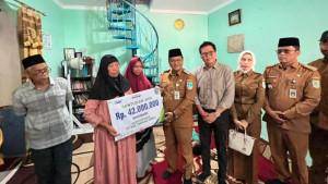 Santunan-JKM-kepada-Ahli-Waris-Ketua-RT-Diserahkan.jpg
