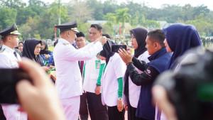 Tim-Medis-Sarolangun-Tembus-Sungai-dan-Jembatan-Gantung-Layani-Warga-Lewat-Program-Dokter-Maju.jpg