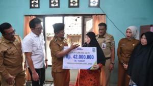 Walikota-Jambi-Serahkan-Santunan-JKM-Kepada-Ahli-Waris-di-Seberang-Kota-Jambi.jpg