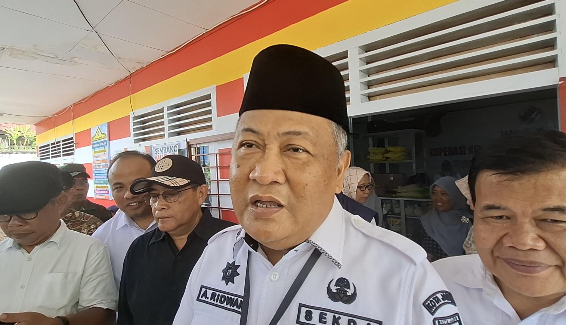 24600-Warga-Kota-Jambi-Terima-Bantuan-Sembako.jpg