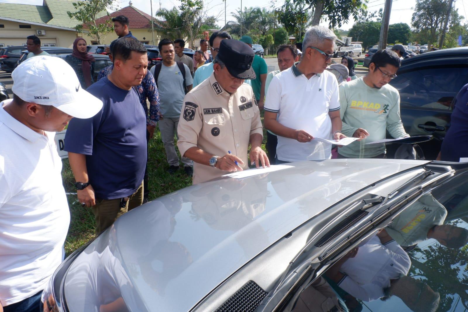 Ratusan Mobil Dinas Dikumpulkan, Pemkab Muaro Jambi Tertibkan Aset Daerah