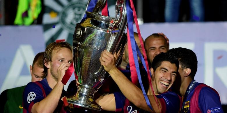 ivan-rakitic-dan-luis-suarez-juara-piala-champions_20150607_085937.jpg