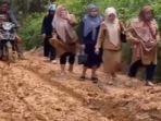 20250419-jalan-rusak-viral-di-Telentam-Bungo.jpg
