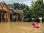 Desa-Pulau-Kayu-Aro-Kecamatan-Sekernan-Kabupaten-Muaro-Jambi-terendam-banjir.jpg