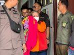 Helen-Dian-Krisnawati-ini-mengikuti-sidang-perdana-di-Pengadilan-Negeri-Jambi.jpg