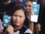 Ilustrasi-Pekerja-Migran-Indonesia-PMI.jpg