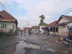 Jalan-Rusak-di-Tahtul-Yaman.jpg