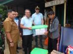Junaidi-H-Mahir-menyalurkan-Bantuan-Sosial.jpg