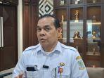 Kepala-Dinas-Pendapatan-Pengelolaan-Keuangan-dan-Aset-Daerah-Husni.jpg