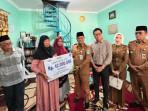 Santunan-JKM-kepada-Ahli-Waris-Ketua-RT-Diserahkan.jpg