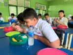Siswa-di-SDN-92-Kota-Jambi-saat-santap-Makan-Begizi-Gratis-atau-MBG.jpg
