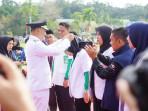 Tim-Medis-Sarolangun-Tembus-Sungai-dan-Jembatan-Gantung-Layani-Warga-Lewat-Program-Dokter-Maju.jpg