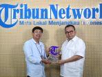 Wakil-Direktur-Pemberitaan-Tribun-Network-Domuara-Ambarita-m.jpg