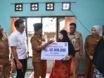 Walikota-Jambi-Serahkan-Santunan-JKM-Kepada-Ahli-Waris-di-Seberang-Kota-Jambi.jpg