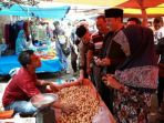calon-bupati-dan-wakil-bupati-kerinci-zainal-abidin-dan-arsal-apri_20180308_143751.jpg