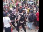 cekcok-soal-karcis-anggota-brimob-terlibat-bentrok.jpg