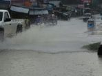 genangan-air-di-jalan-raya-kota-jambi-minggu-84_20180408_153009.jpg