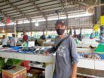 herman-si-penjual-ikan-di-pasar-angso-duo.jpg