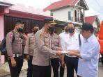 kapolres-kerinci-pimpinan-olah-tkp-dan-beri-bantuan-kepada-korban-kebakaran.jpg