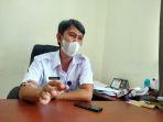 kepala-bidang-mutasi-dan-pengembangan-asn-di-bkd-kabupaten-muarojambi-hendra.jpg