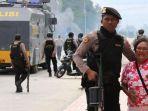kerusuhan-di-mimika-papua-brimob.jpg