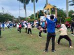 lomba-tarik-tambang-hut-jambi.jpg