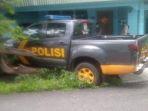 mobil-polisi-tabrak-rumah-warga.jpg
