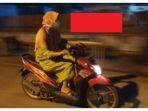 pengendara-motor-berdaster-jilbab.jpg
