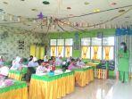 perjuangan-irma-sinaga-guru-honorer-ajak-orangtua-bangun-literasi-di-jambi.jpg