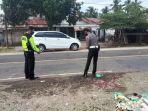 polisi-saat-di-tkp-kecelakaan-maut-di-muara-bulian.jpg