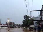 sejumlah-pemukiman-warga-dan-jalan-protokol-terendam-banjir-di-kota-jambi.jpg