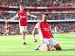 striker-arsenal-aubameyang-merayakan-golnya-yang-dicetak-ke-gawang-tottenham.jpg