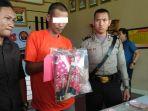 tersangka-rudapaksa-diamankan-di-polresta-jambi.jpg