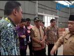 tim-satgas-pangan-merangin-sidak-ke-bulog-dipimpin-langsung-bupati-al-haris.jpg