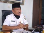 tobroni-yusuf-kepala-dinas-bpbd-dan-kesbangpol-bungo.jpg