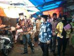wabup-tanjabbar-sidak-ke-pasar-tanggo-rajo-pastikan-harga-bahan-pokok-aman-jelang-nataru.jpg