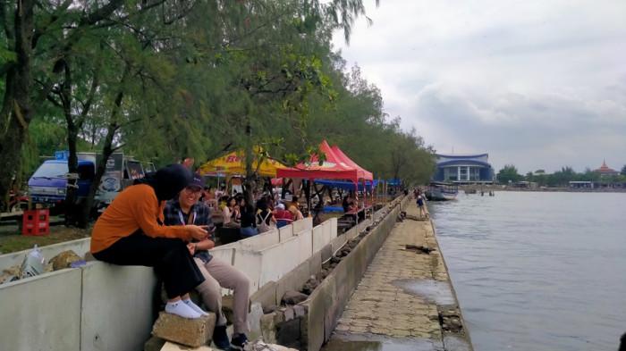 LIBUR NATARU - Dokumentasi suasana Pantai Marina Semarang, beberapa waktu lalu. DPRD mendorong Pemkot Semarang melakukan persiapan matang, khususnya di sektor pariwisata jelang libur Nataru 2025-2026.