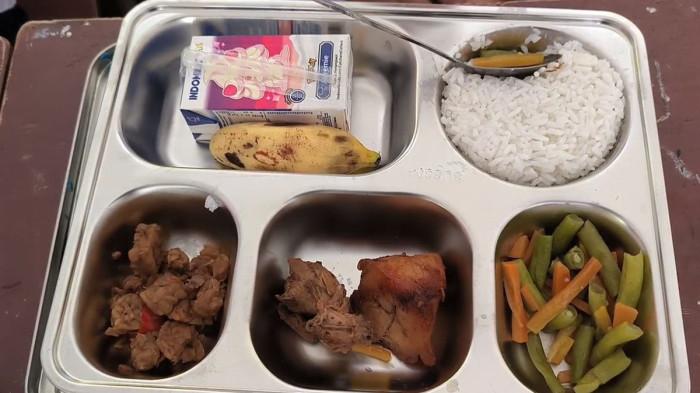 MBG -  Program Makan Bergizi Gratis (MBG) di Kabupaten Demak tetap berjalan meskipun memasuki masa libur sekolah. (dok. kompas.com)