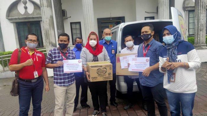 Alfamart Salurkan Bantuan Banjir Semarang